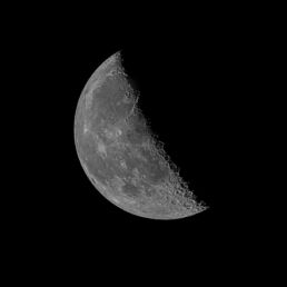 Black and white photograph of the waning crescent Moon with delicate surface detail